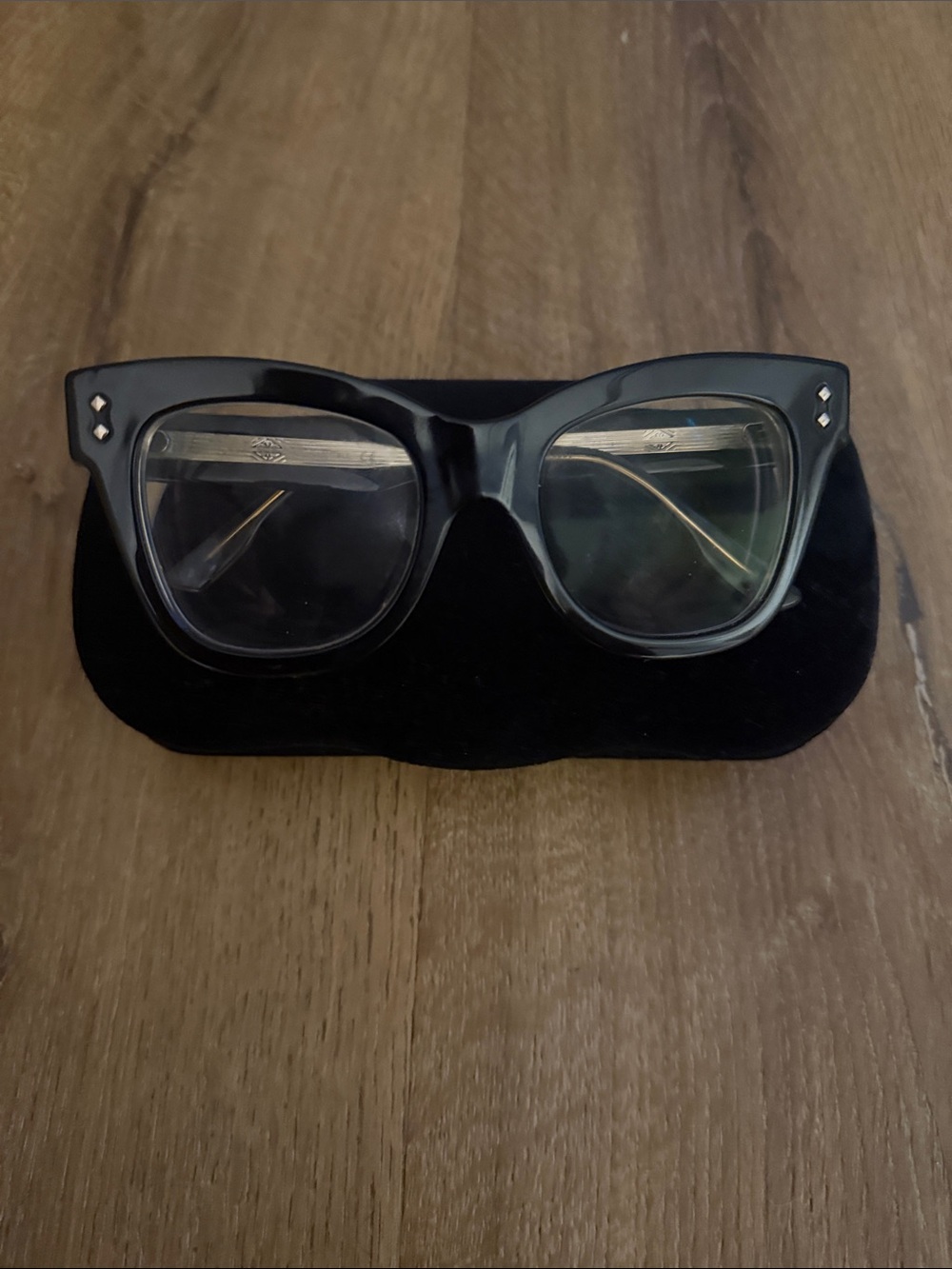 Gucci Black Thick-Frame Cat-Eye Glasses with gold accents